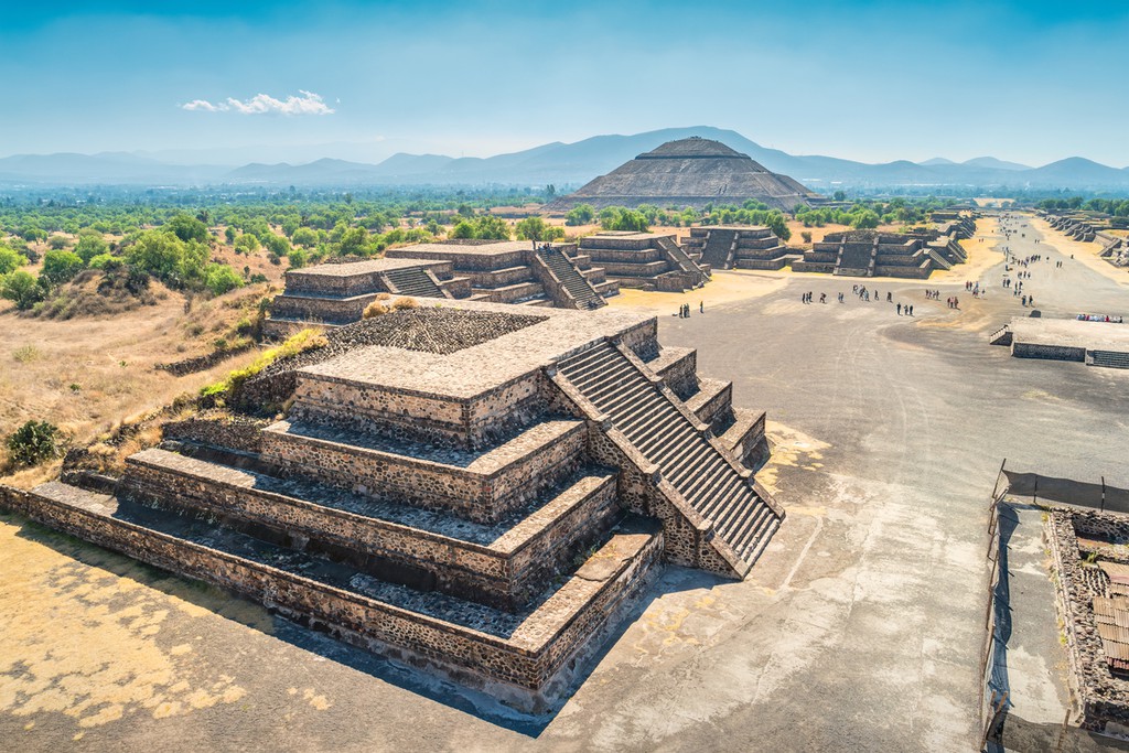 The Teotihuacan pyramids near Mexico City, Mexico on a sunny day, with the Pyramid of the Sun in the background.