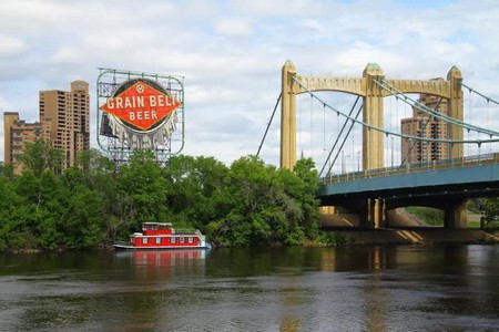 The iconic 'Grain Belt Beer' sign sits on the edge of Minneapolis' North Loop along the Mississippi River