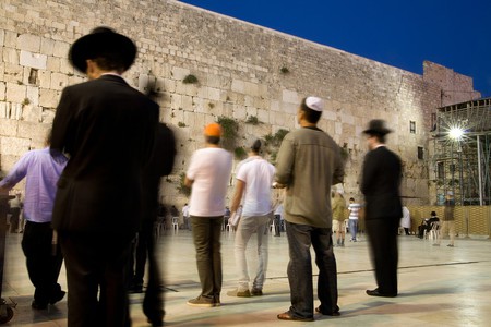 Men praying at the Western Wall, Jerusalem, Israel