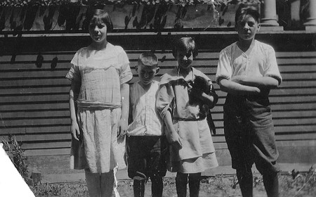 Schaffner Agnes Martin siblings photo. (L to R: Maribel, Malcom Jr., Agnes with cat, Ronald). Courtesy of Christa Martin, Martin Family Archive