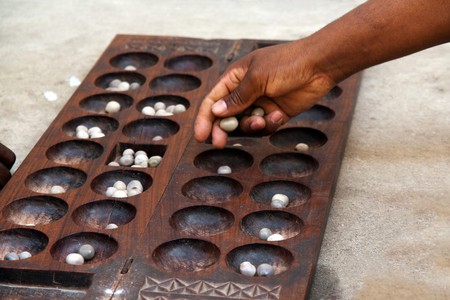 Nsolo or Mancala is a popular game played in Zambia