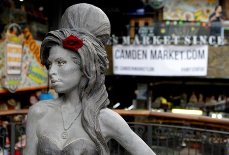 A life-size bronze statue of Camden local Amy Winehouse, complete with a red rose in her trademark beehive hairdo