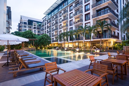 Enjoy a relaxing swim in the pool at the Amanta Hotel & Residence Ratchada