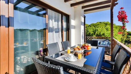 Enjoy your meals on your private balcony at Falesia Beach B