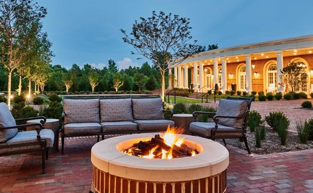 Enjoy cozy moments by the fire pit at the Inn at Elon
