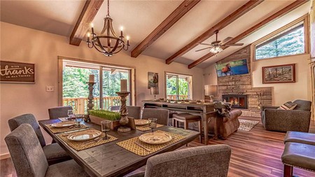 Angel Falls has two separate living rooms, each with a gas fireplace, a cozy reading nook and a seating area by the river outside