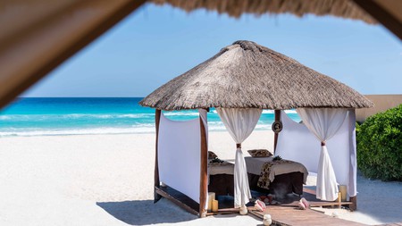 What's better than relaxing on the white sand of a Cancun beach? That and a massage, of course