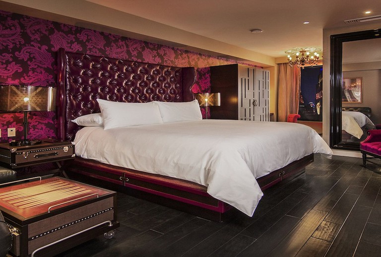 Boutique double bedroom with romantic design and backgammon table at the Cromwell