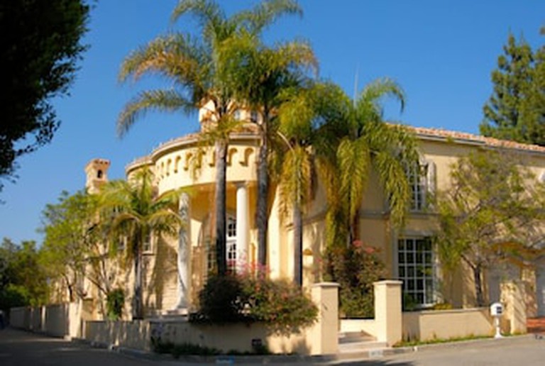 Exterior of expansive Mediterranean-style Stradella Court Mansion, a vacation rental in Bel Air, Los Angeles