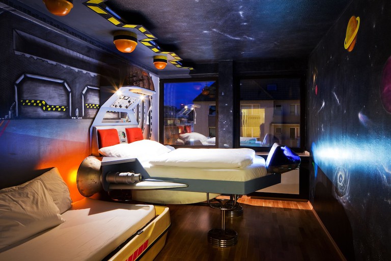 The spaceship-themed bedroom at Die Wohngemeinschaft hotel in Cologne