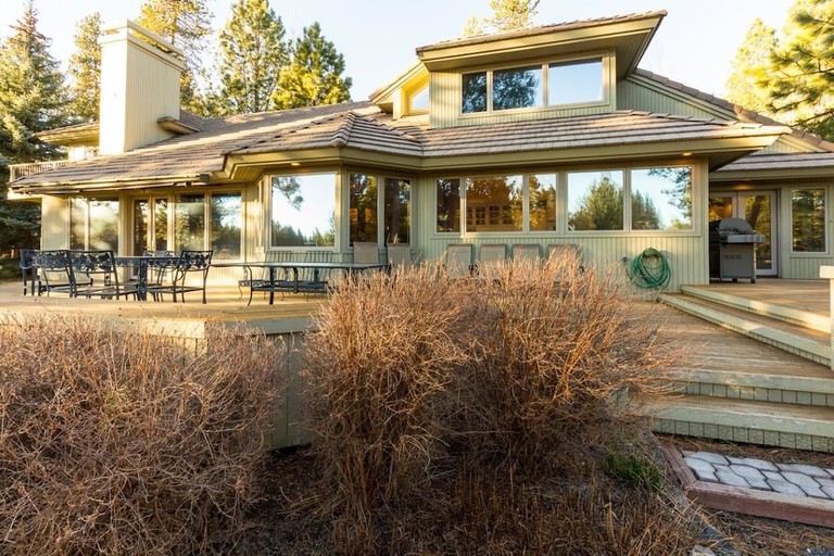 Large, upscale vacation rental featuring lots of windows and a large deck for outside dining at Bachelor 5 near Bend