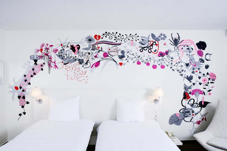 Hotel Bloom! twin room with floral wall design