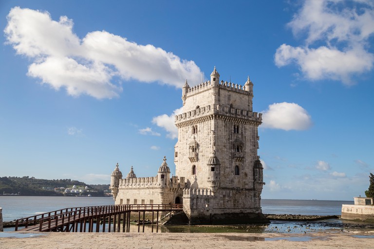 The exterior of the Belém Tower features crosses and twisted rope embellishments