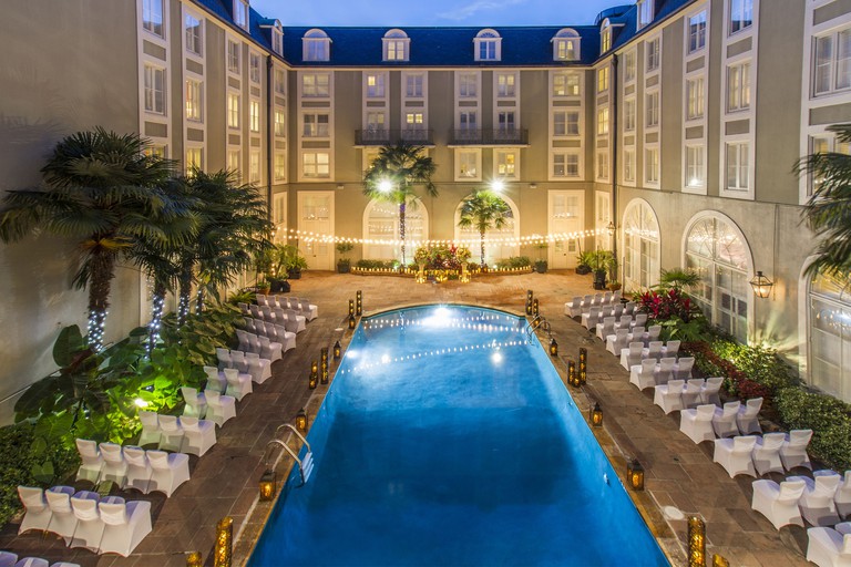 Bourbon Orleans Hotel outdoor pool with fairy lights and palms