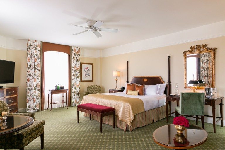 Large traditional room with plush carpeting at the Hermitage Hotel with pattern floor