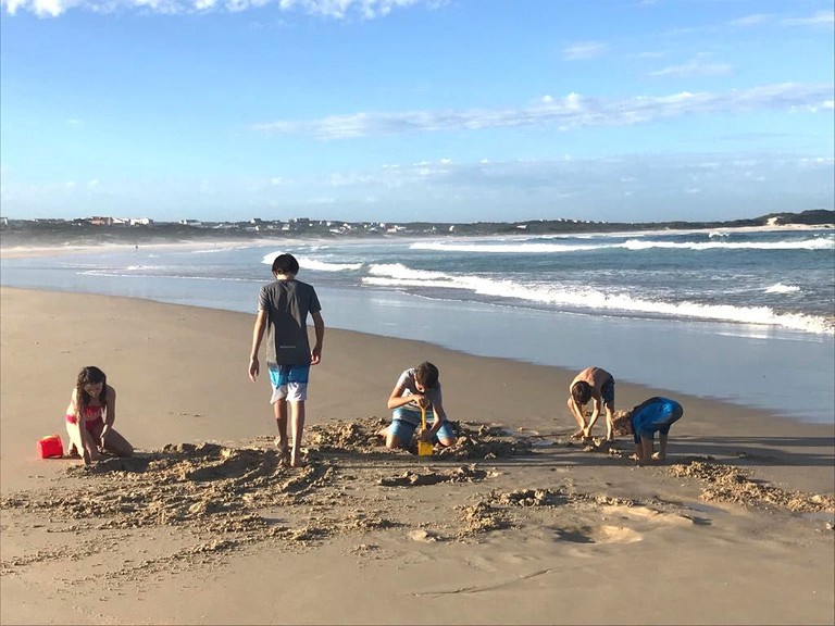 Kids playing in the sand at Seal Point beach