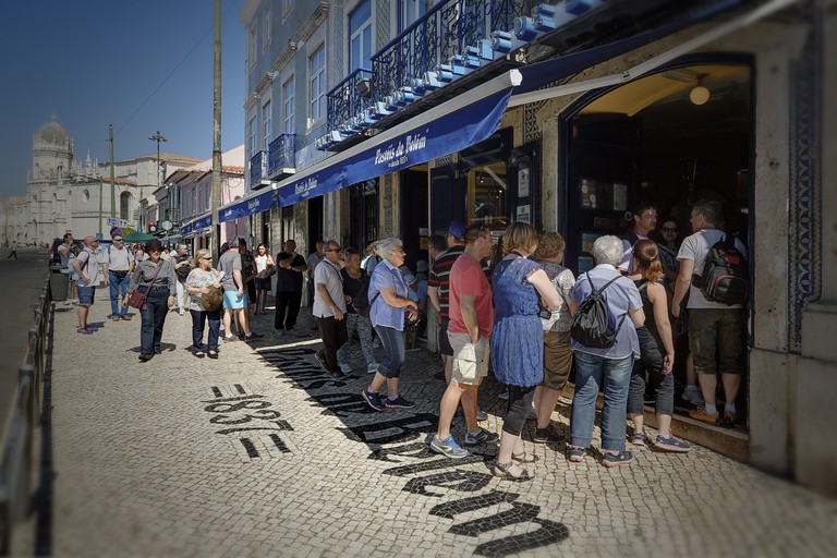People queue outside Pasteis de Belem in Lisbon