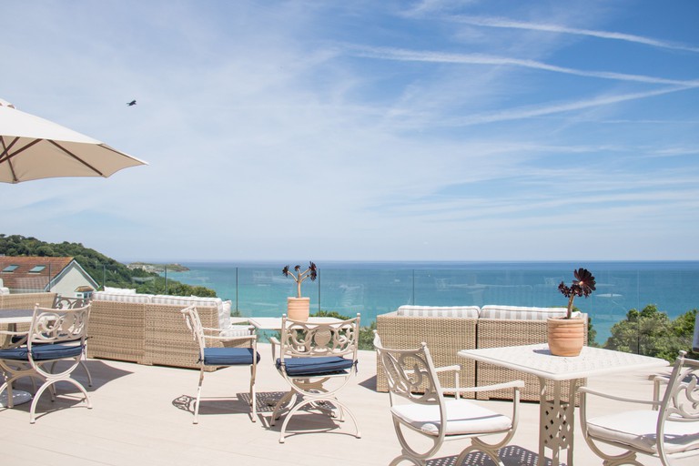 Outdoor terrace with sea views at Boskerris Hotel St Ives