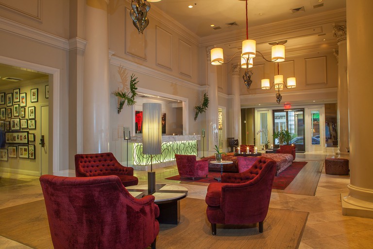 Plush arm chairs in the elegant lobby at the International House Hotel in New Orleans.