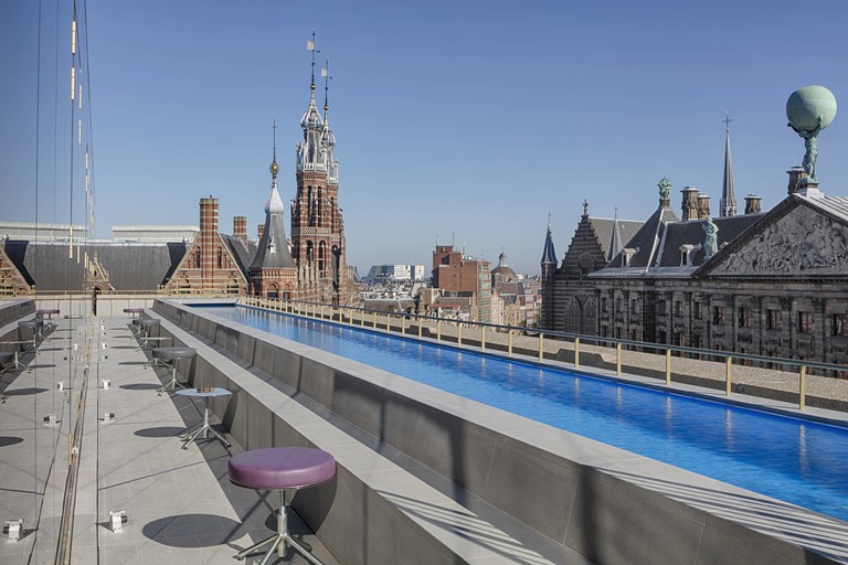 The incredible rooftop pool, with views over Dam Square and Amsterdam's landmarks, at the W Amsterdam