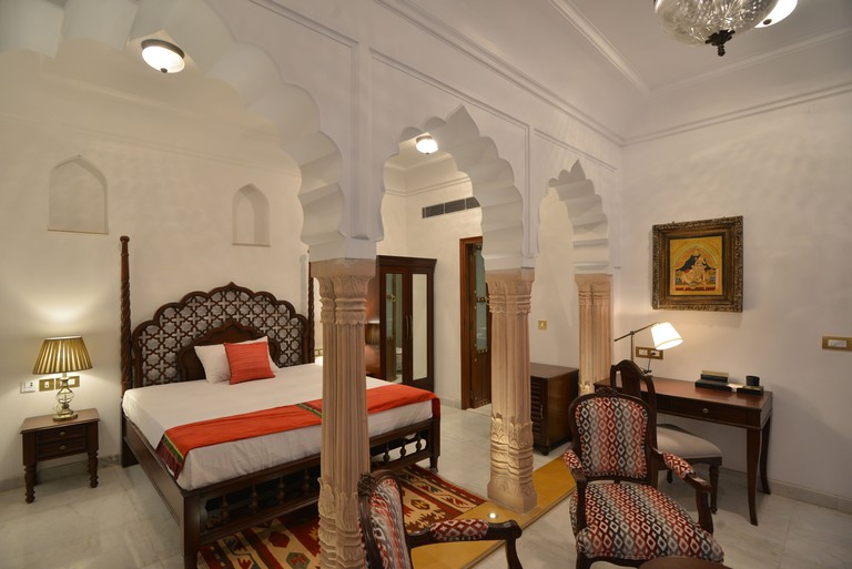 A traditionally furnished room at Haveli Dharampura