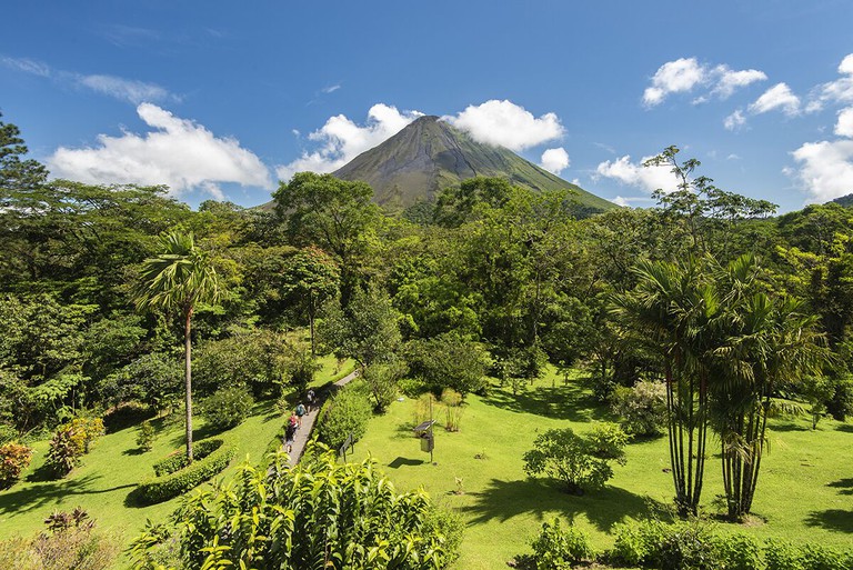 Path way through greenery leading towards Arenal Volcano - at Arenal Observatory Lodge & Spa
