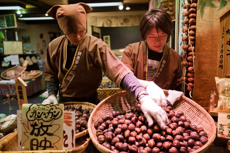 Nishiki Market is a narrow shopping street in Kyoto lined with more than one hundred shops.