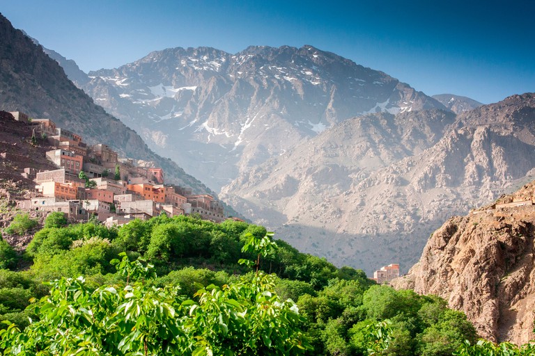 View of Mt Toubkal and a traditional Berber village near Imlil in the High Atlas mountains, Morocco, North Africa.