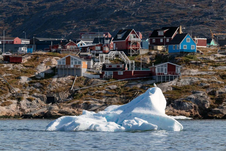 An iceberg floating in the coastline of Ilulissat, Greenland.