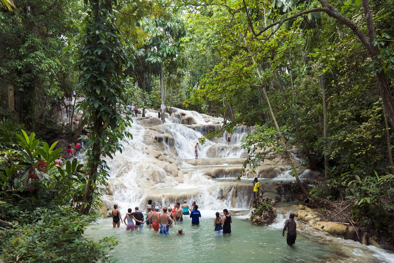 Tourists Climbing Dunns River Falls, Ocho Rios, Jamaica, Caribbean, West Indies. Image shot 09/2009. Exact date unknown.