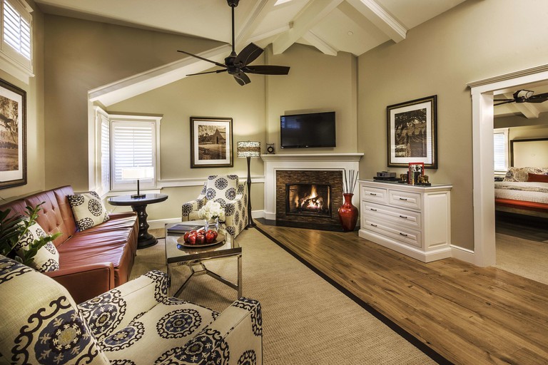 A large lounge with fireplace in a suite at Fess Parker Wine Country Inn