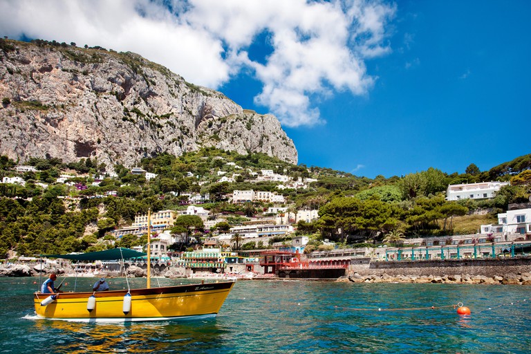 View from a boat towards Marina Piccola, Capri, Bay of Naples, Campania, Italy