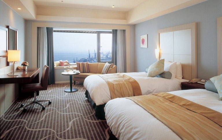 A two-bed guest room at Hotel Okura Kobe