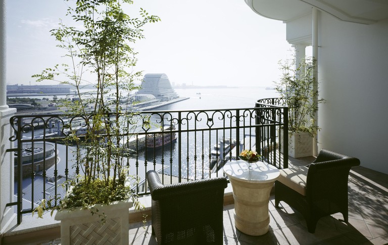 A balcony at the Hotel La Suite Kobe Harborland overlooks the Port of Kobe
