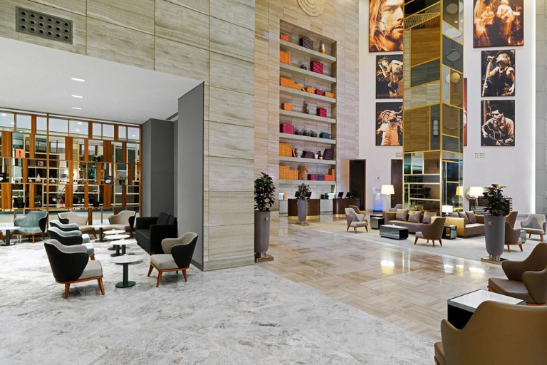 A high-ceilinged social area in Sheraton Batumi Hotel