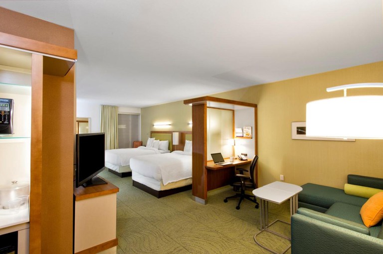 A warm, homey studio with two beds at the SpringHill Suites by Marriott Bellingham