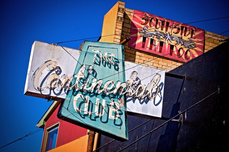 A close-up of the Continental Club sign
