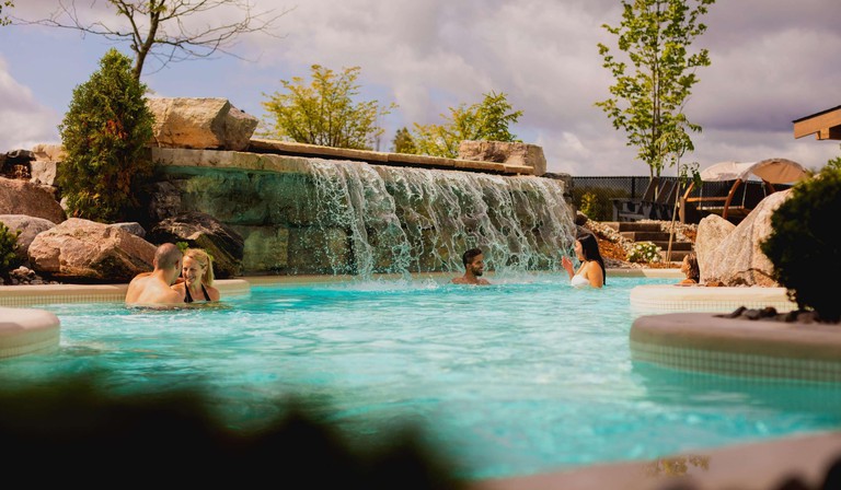 Guests enjoy the pool at DoubleTree by Hilton Hotel Gatineau-Ottawa, Gatineau, Canada