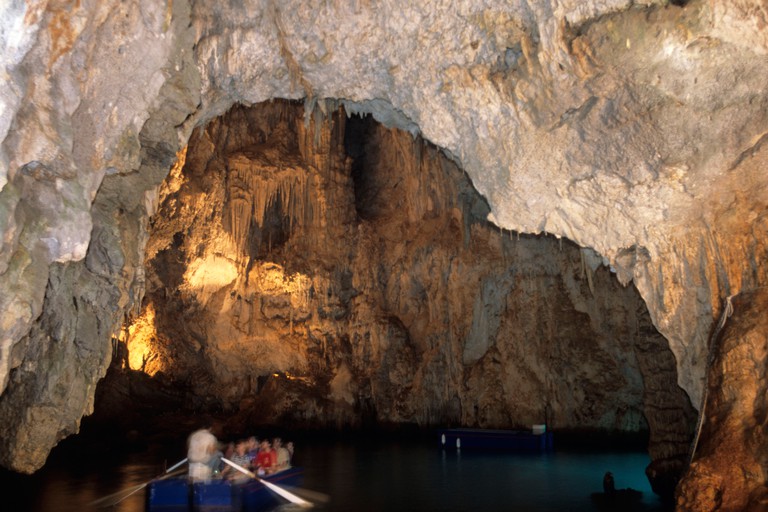 Paddling in Emerald Grotto, near Amalfi, Campania, Italy