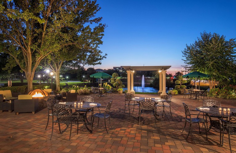 The stunning terrace with firepit and garden furniture at the Hilton Wilmington
