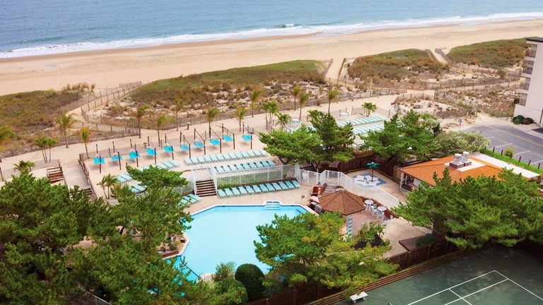 View of the pool and beach at Holiday Inn Ocean City, Ocean City, Maryland