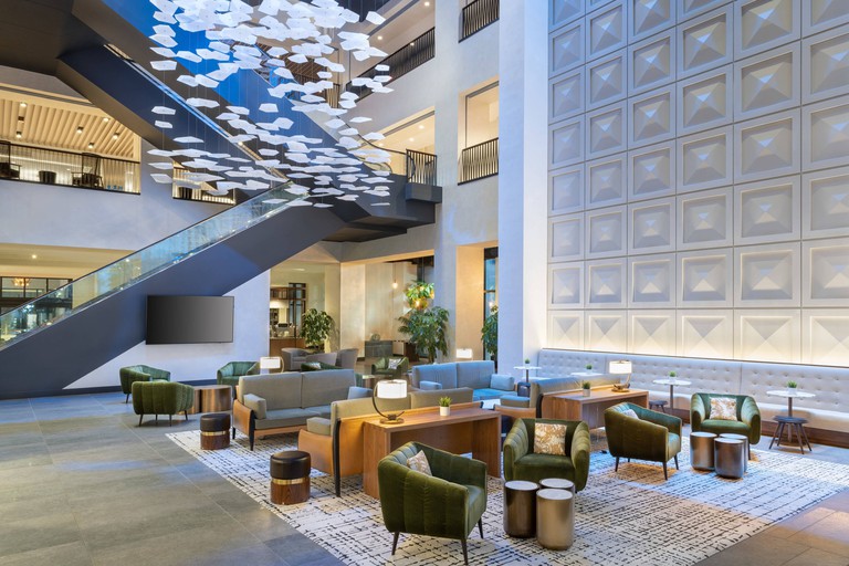 Large lobby at JW Marriott Tampa Water Street, with various soft seating options