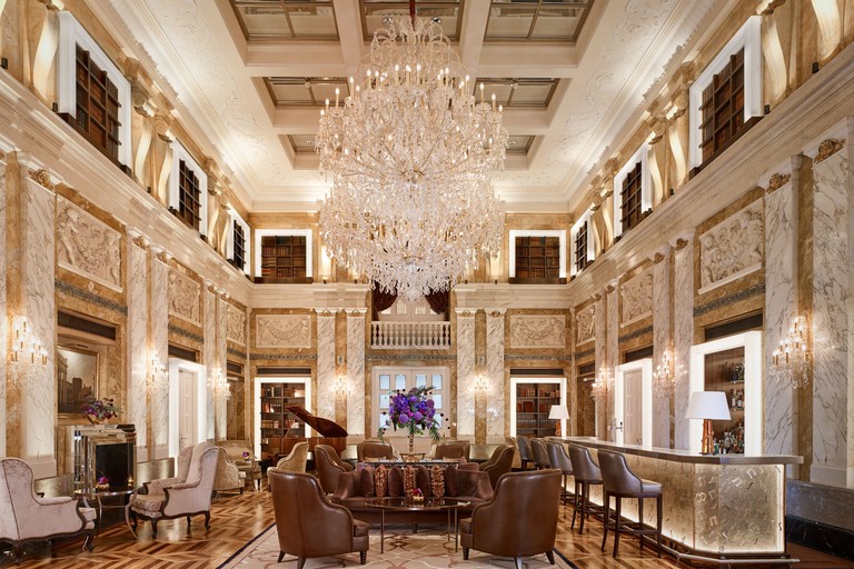 The grand Hotel Imperial bar with huge chandelier and marble decor