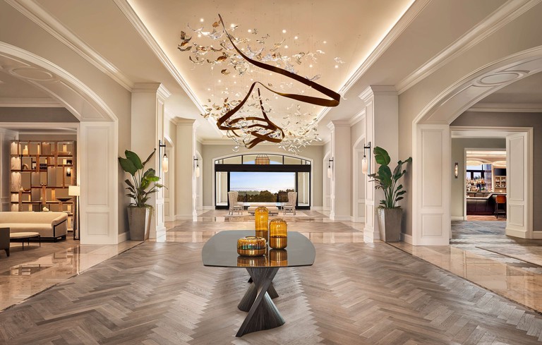 The expansive, luxe lobby area with a hanging sculpture at the Park Hyatt Aviara Resort