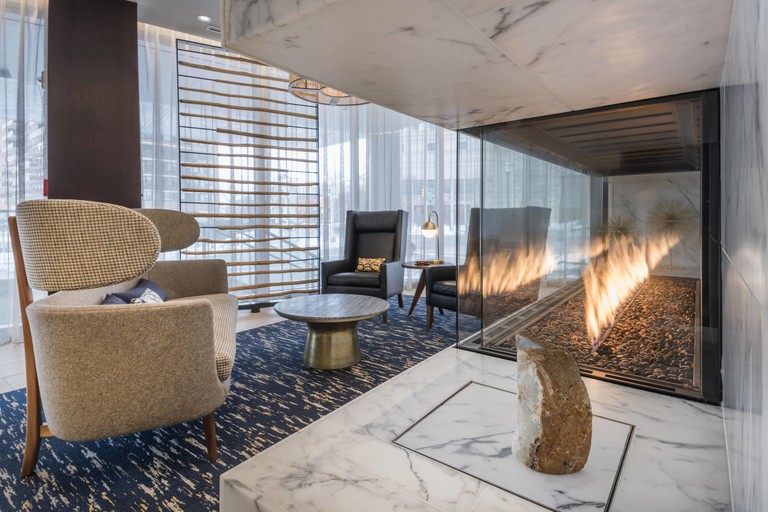 Fireplace and lounge chairs in the Residence Inn by Marriott Jersey City
