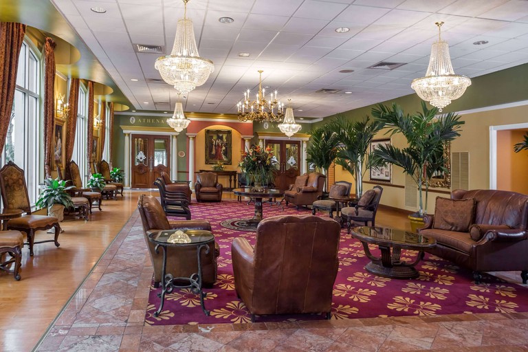 Indoor communal area at Safety Harbor Resort and Spa, with various ornate seating options beneath a chandelier