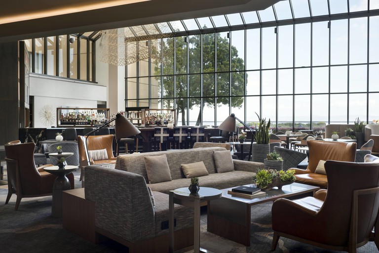 The lofty Flights View Lounge at the San Francisco Airport Marriott Waterfront, complete with bay and airport runway views
