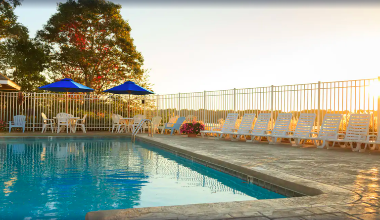Outdoor pool at Bayside Resort Hotel at sunset