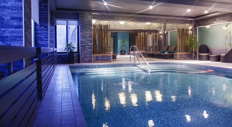 The Victoria Hotel's sleek indoor pool area