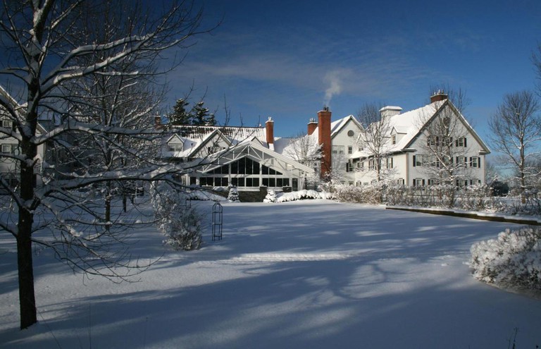 Exterior of the Essex Resort and Spa in the snow